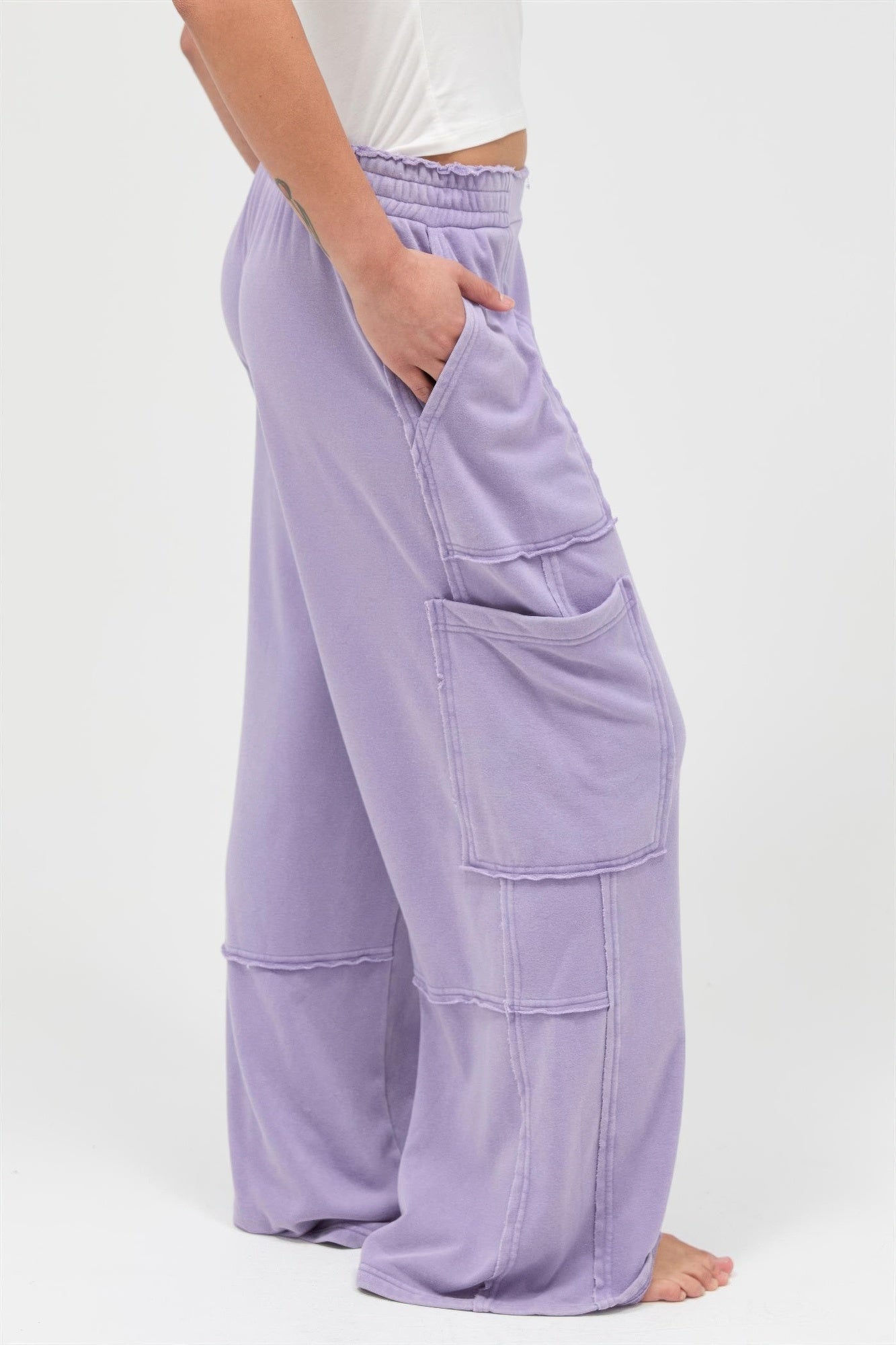Mineral-wash wide-leg cargo pants, dusty purple, side view with flap pocket