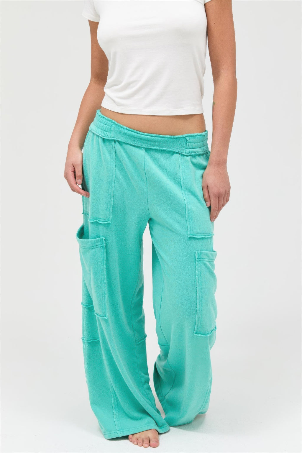 Turquoise mineral-wash wide-leg cargo pants with elastic waist and cargo patch pockets