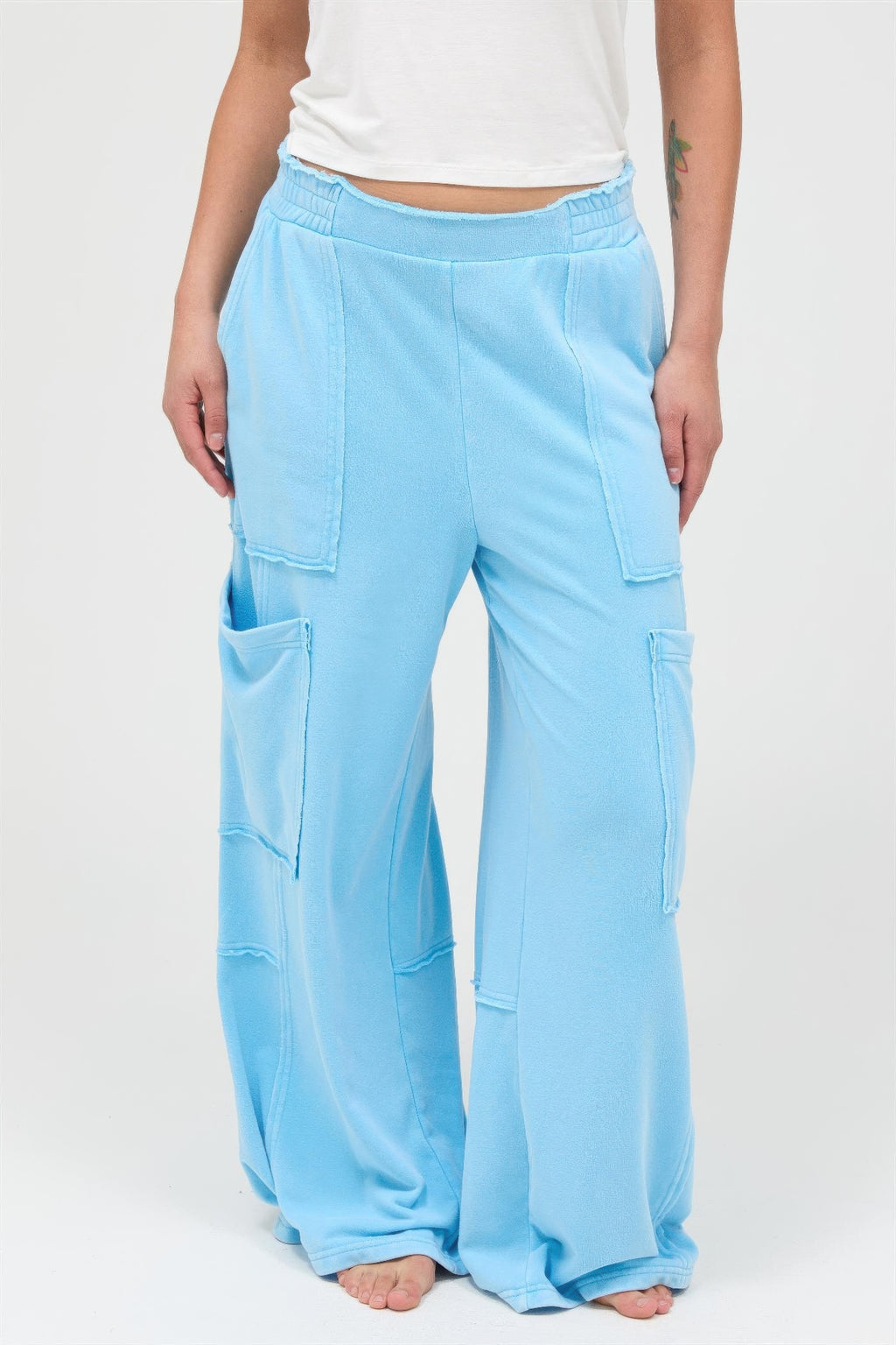 Mineral-wash wide-leg cargo pants, turquoise blue, front view with side cargo pockets