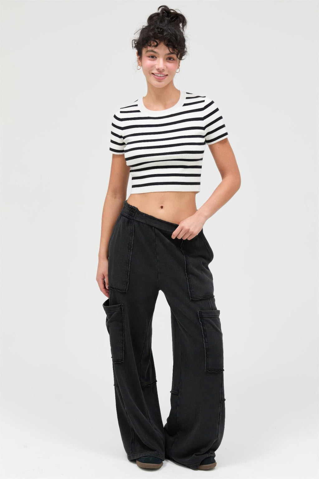 Black mineral-wash wide-leg cargo pants with large cargo pockets and roomy drape