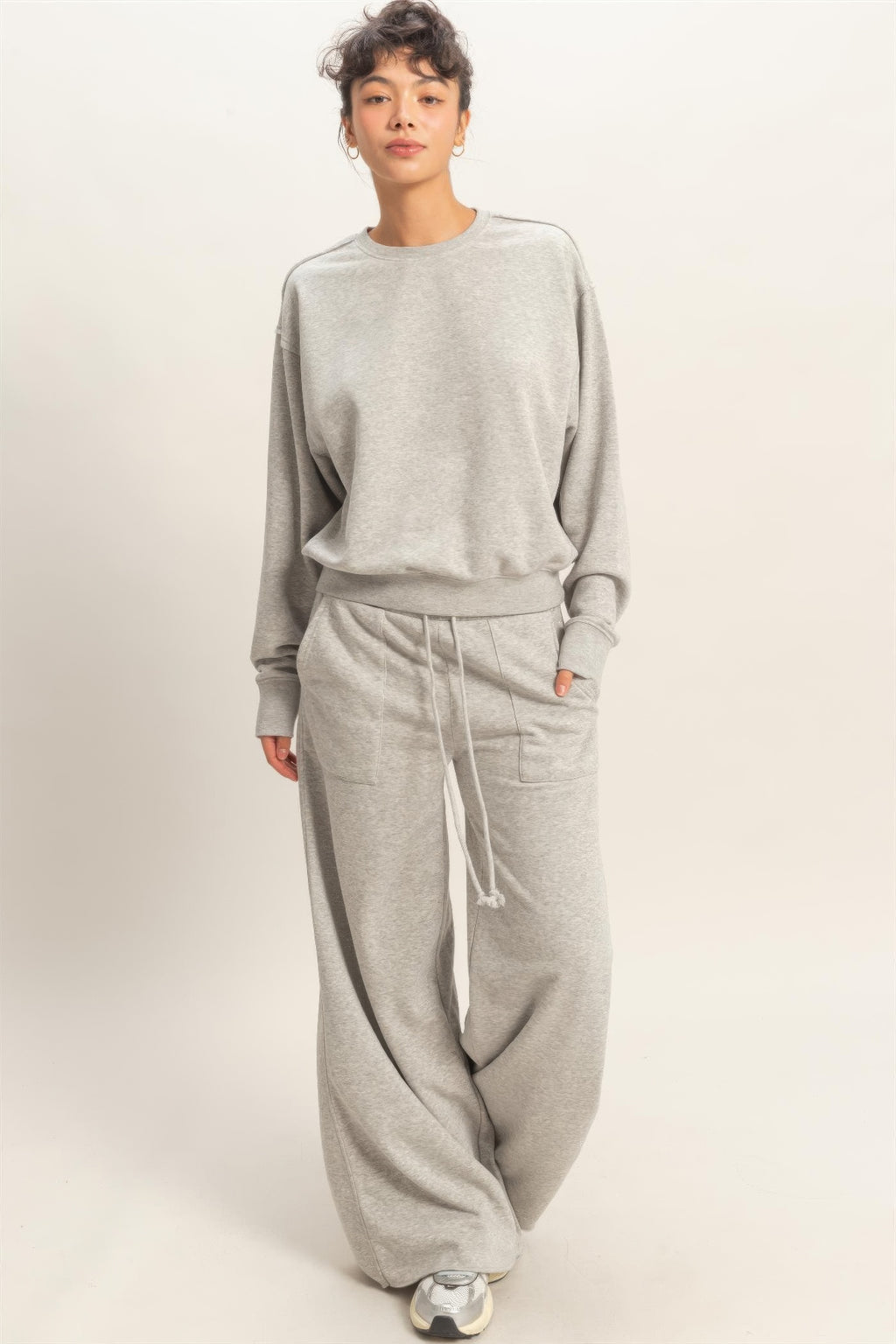 Heather grey burnout sweatshirt with relaxed fit, crew neck, long sleeves