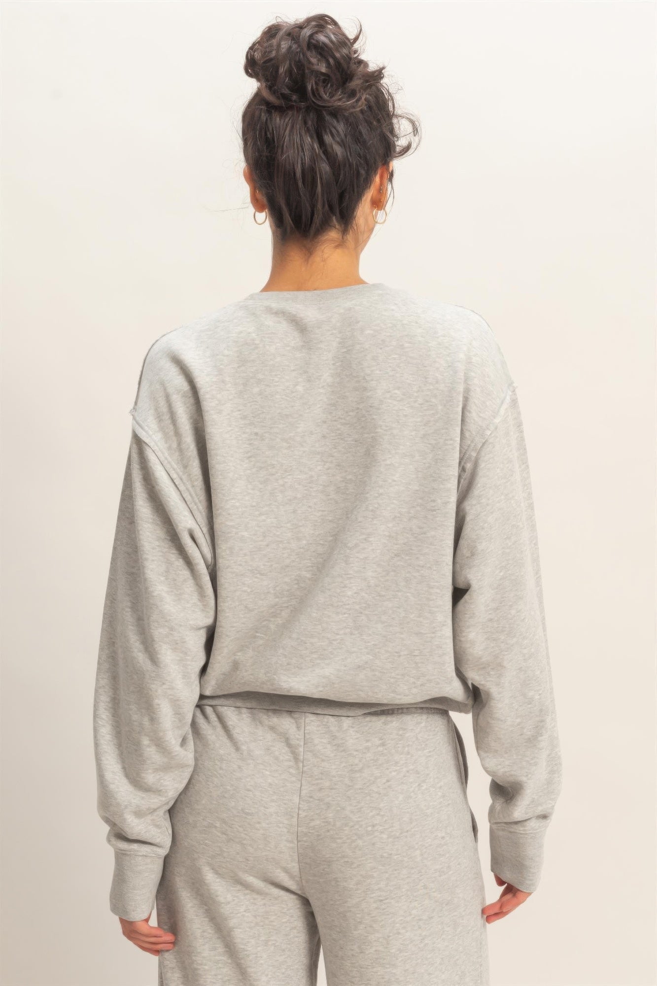 Heather grey burnout sweatshirt back view with crew neck and long sleeves