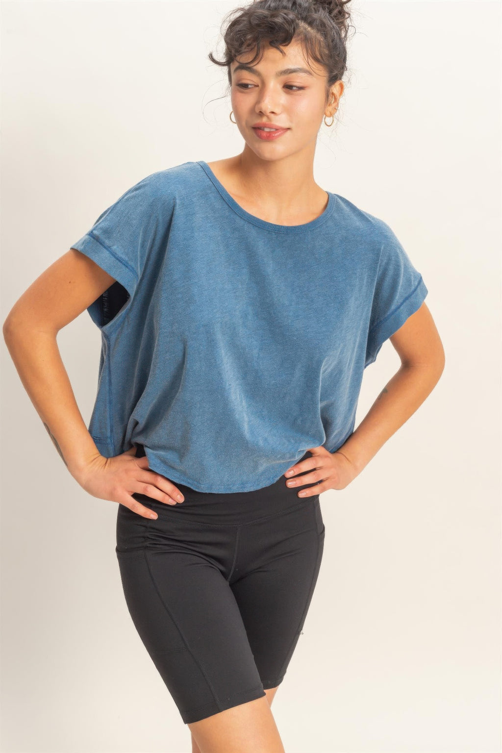 Tigbul’s Variety Fashion Shop blue acid-washed open-back cross-detail top