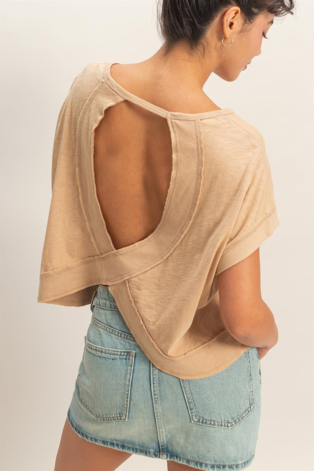 Whip cream cross-detail open-back top, close-up of open back and crossed seam