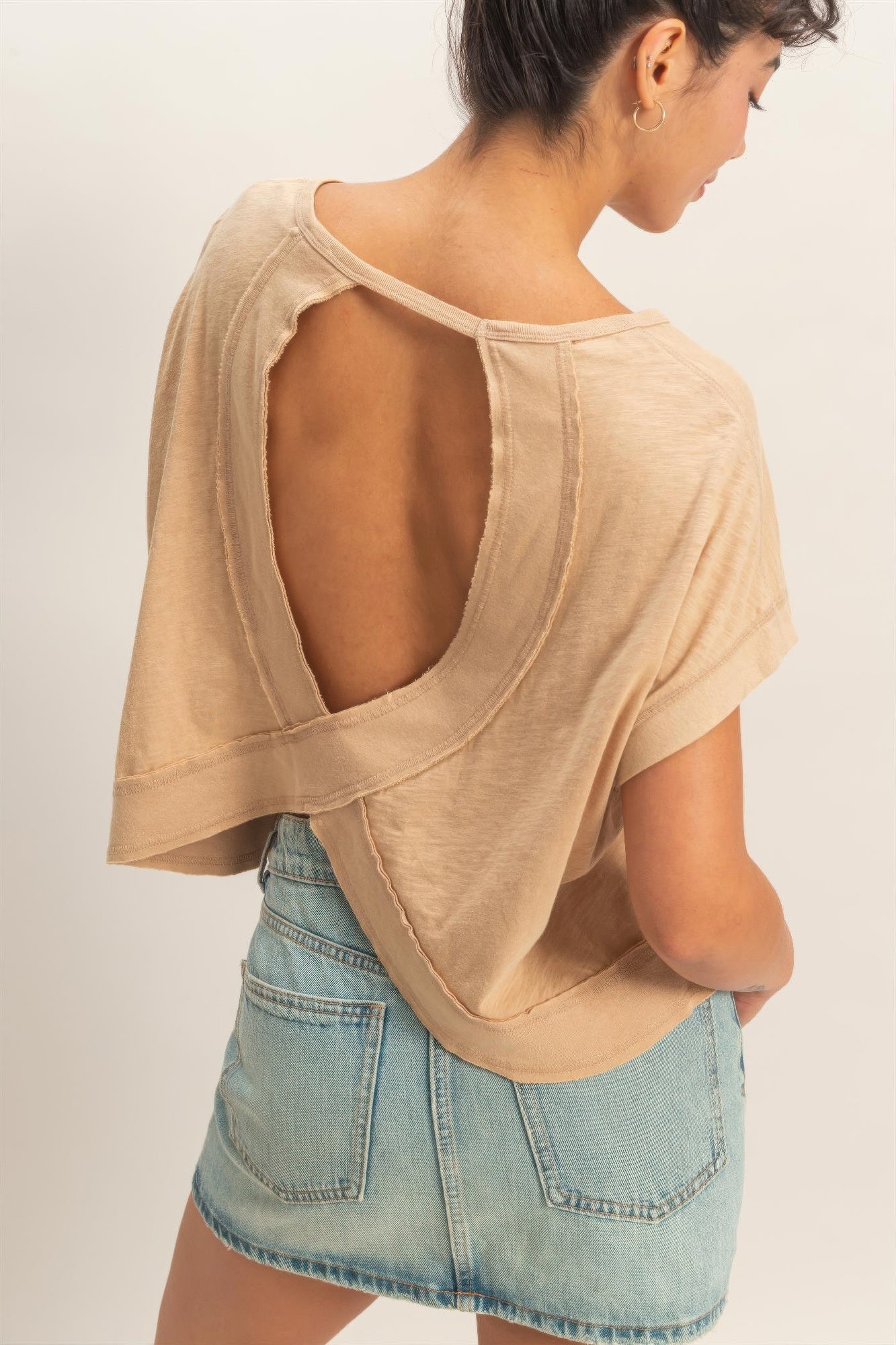 Whip cream cross-detail open-back top, close-up of open back and crossed seam
