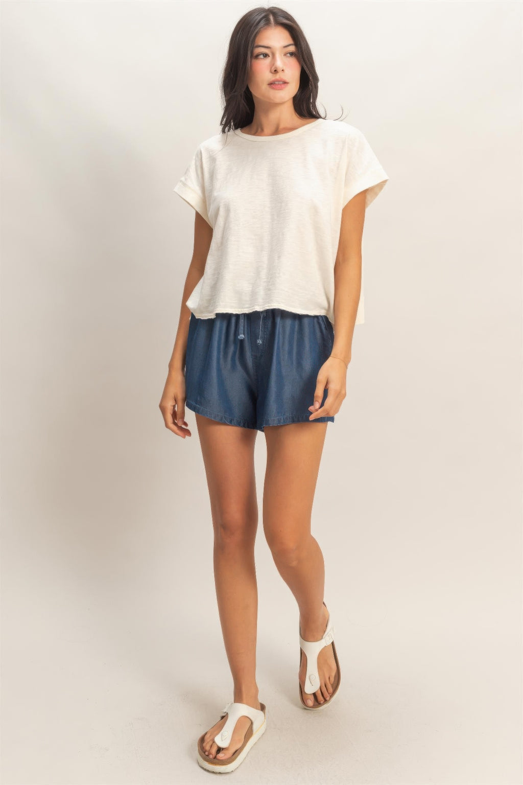 Acid washed cross-detail open-back top, white short-sleeve with relaxed fit