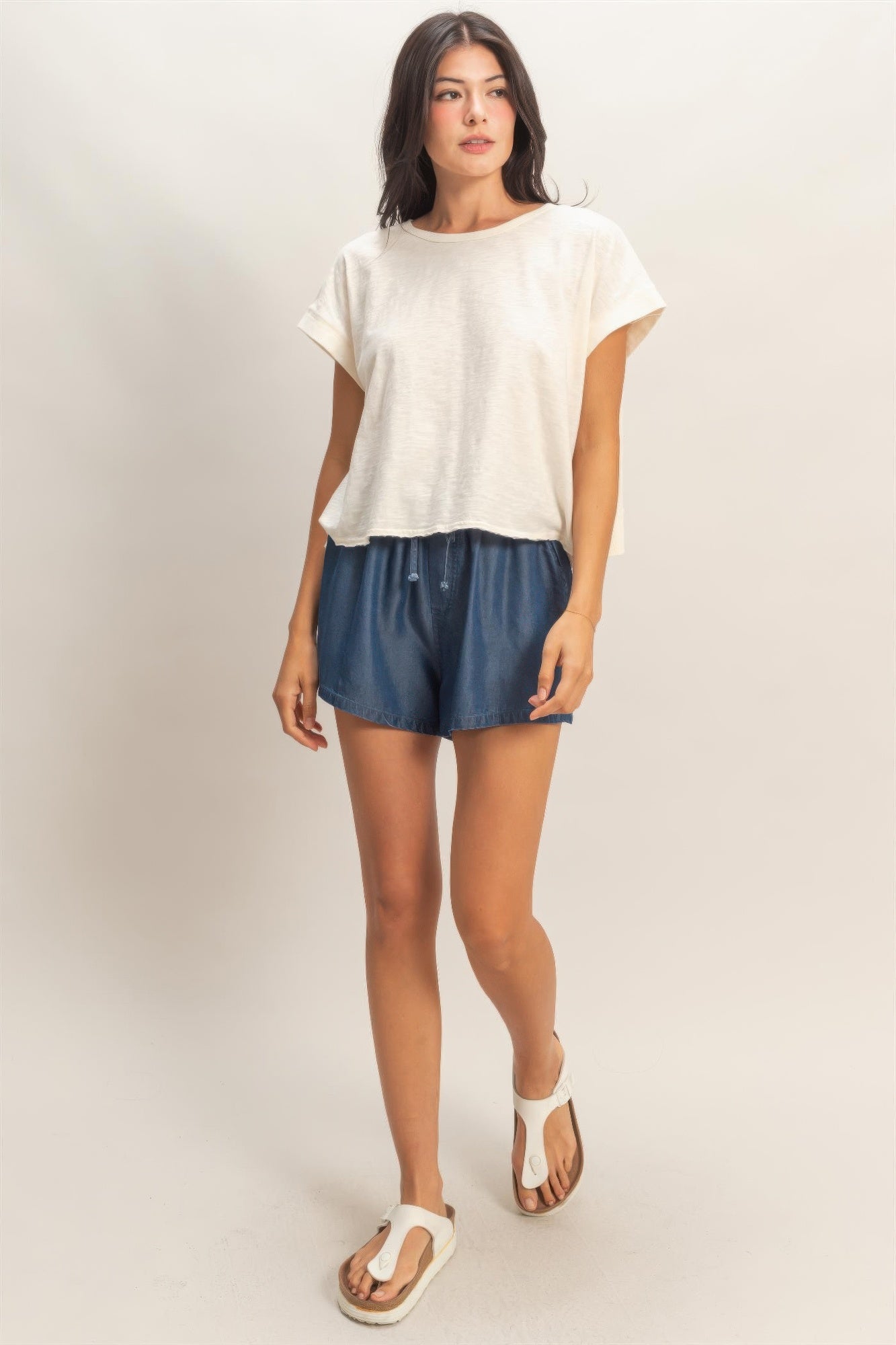 Acid washed cross-detail open-back top, white short-sleeve with relaxed fit