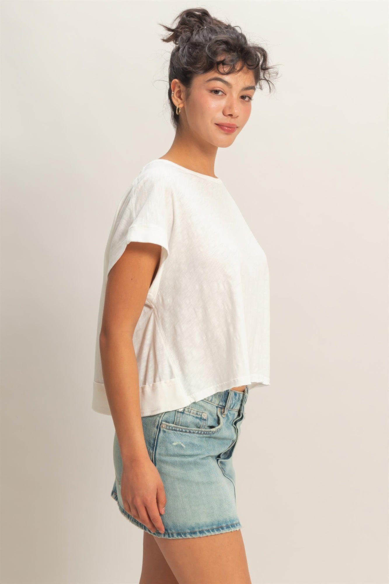 White acid-wash cross-detail open-back top, side view with open-back cutout