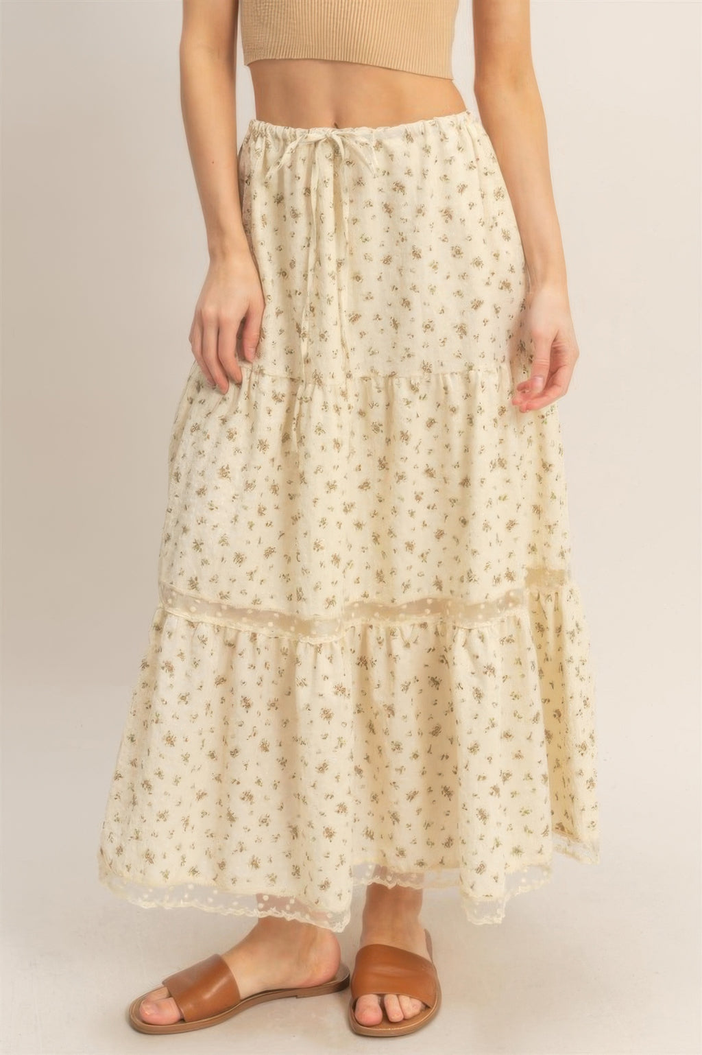 Floral tiered skirt with elastic waist and multiple ruffle layers, lace edging