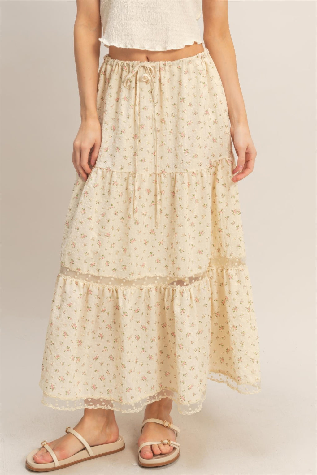 Tiered lace-trim skirt with small floral print, elastic waistband, layered ruffles