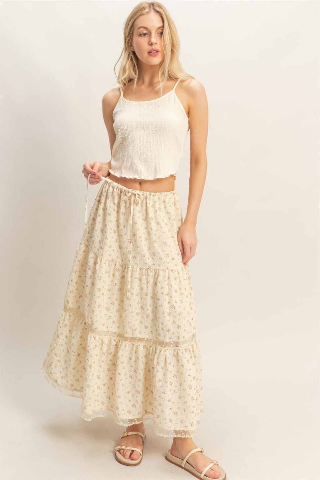 Tiered lace-trim skirt in light floral pattern, full length with ruffle tiers