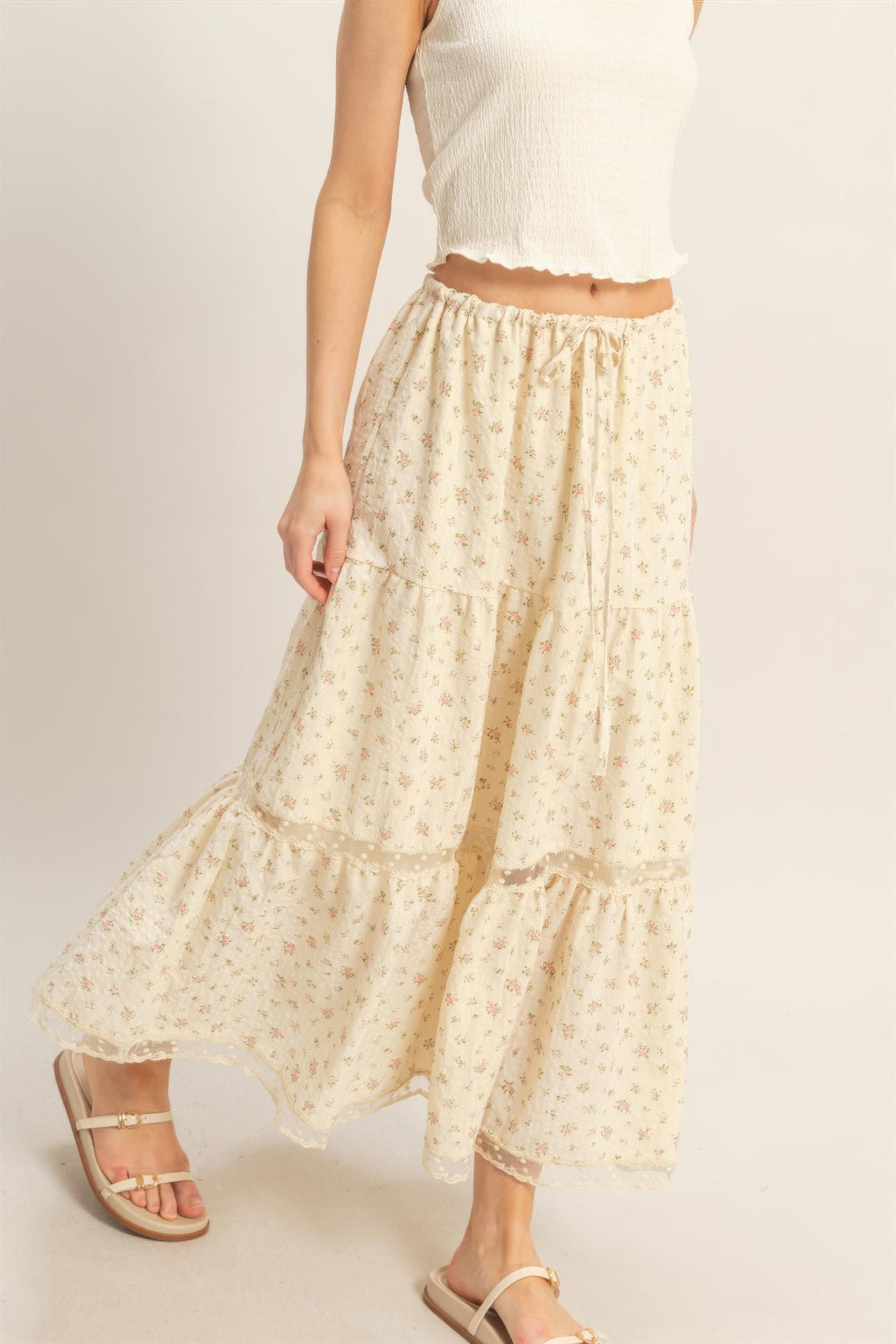 Tiered lace-trim skirt with floral print and scalloped lace hem, midi length