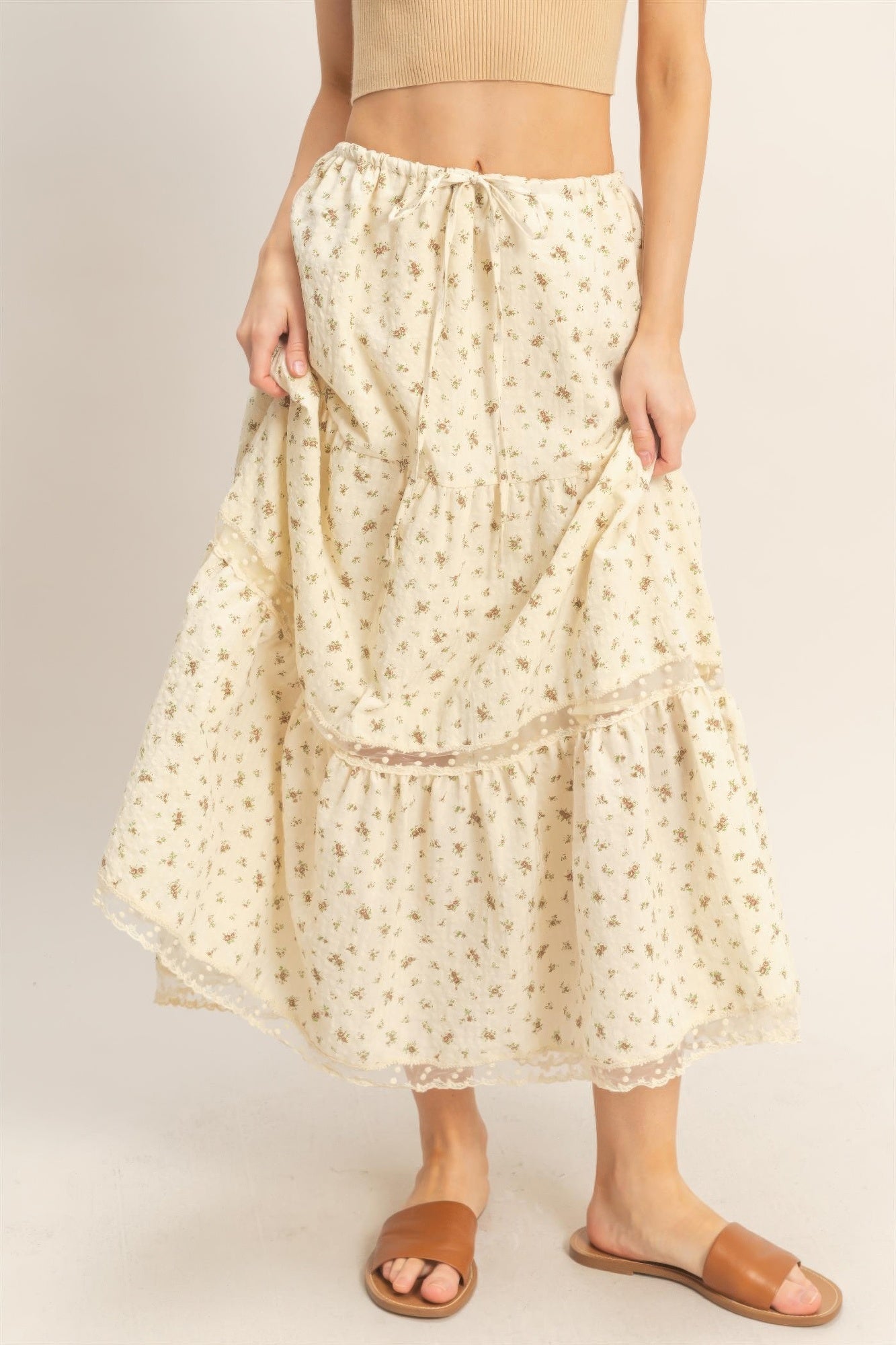 Tiered lace-trim skirt with floral pattern, swinging A-line tiers