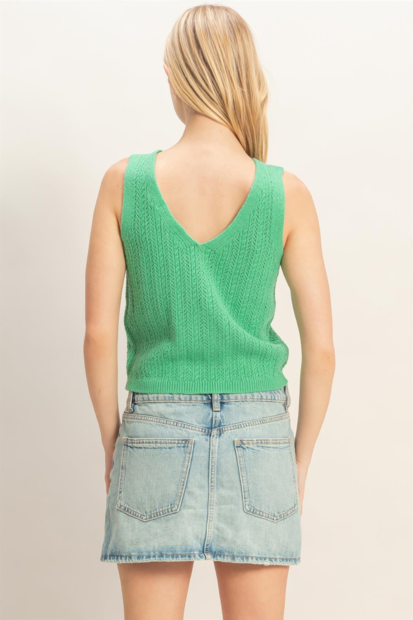 Green V-neck knit tank top, back view, sleeveless