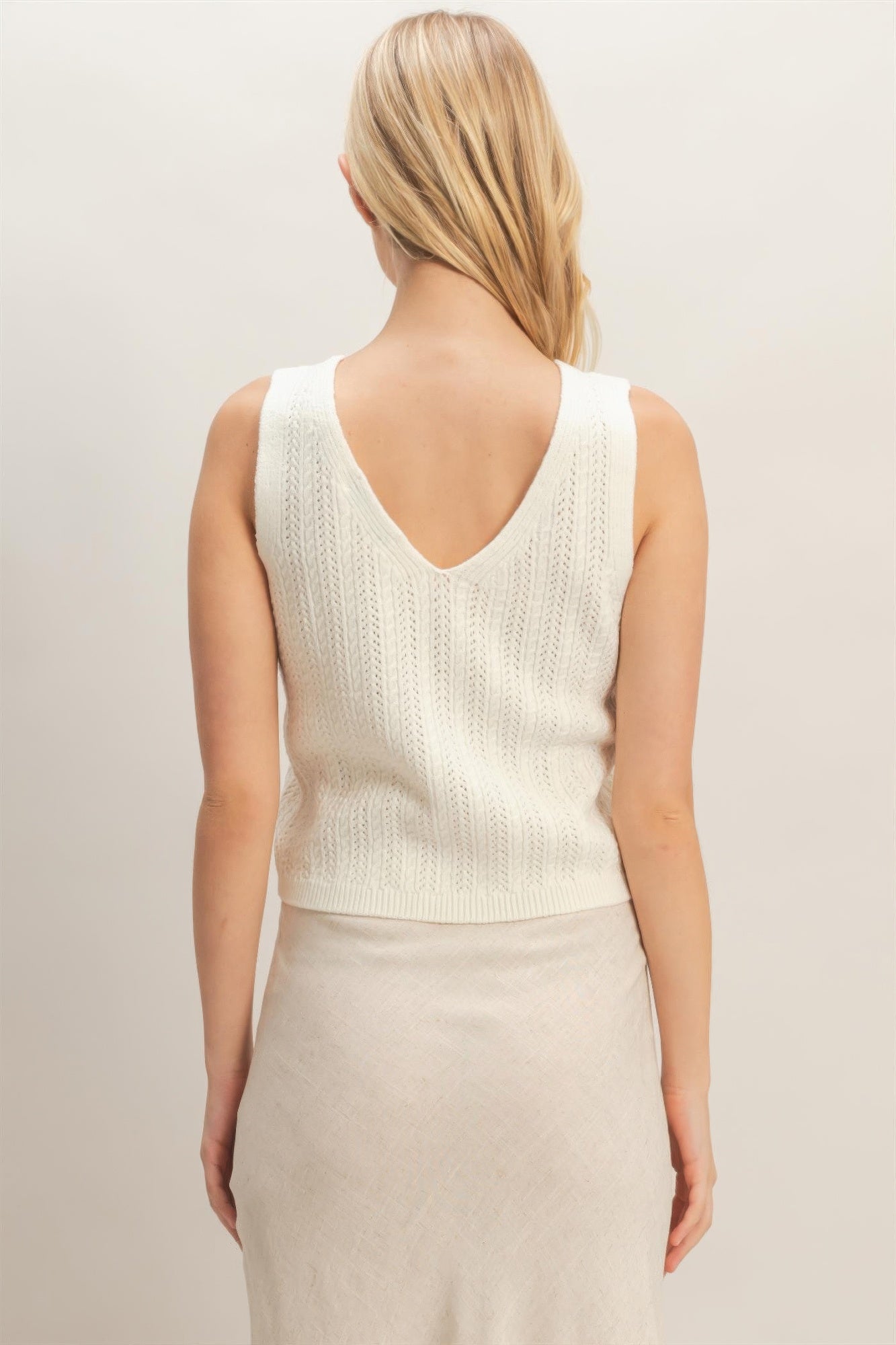 Off-white V-neck knit tank top, back view, sleeveless