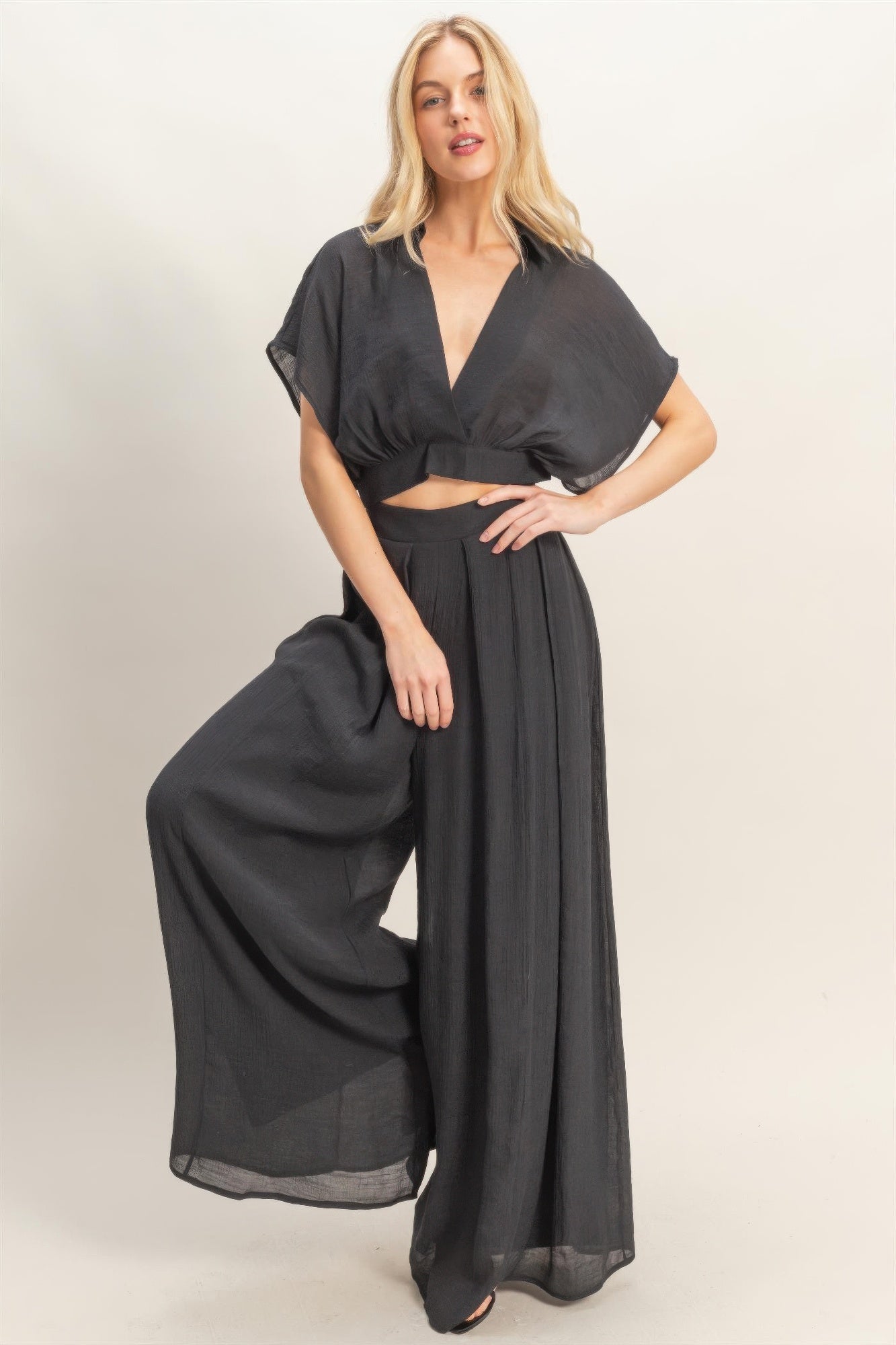 Black collared wrap top and wide-leg pants set, billowy sleeves and wide pant legs