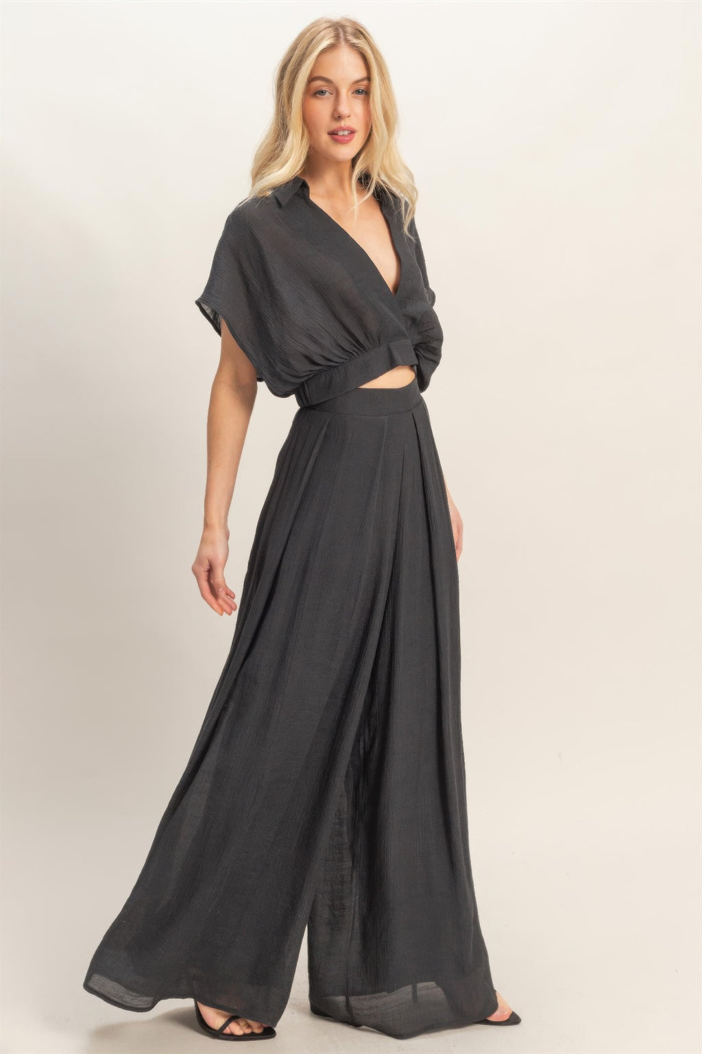 Black collared wrap top and wide-leg pants set, V-neck wrap and pleated, drapey skirt-like pants
