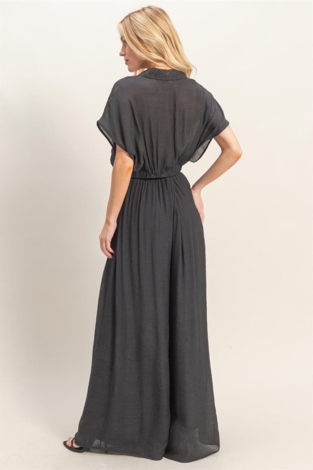 Black collared wrap top and wide-leg pants set, back view with elastic waist