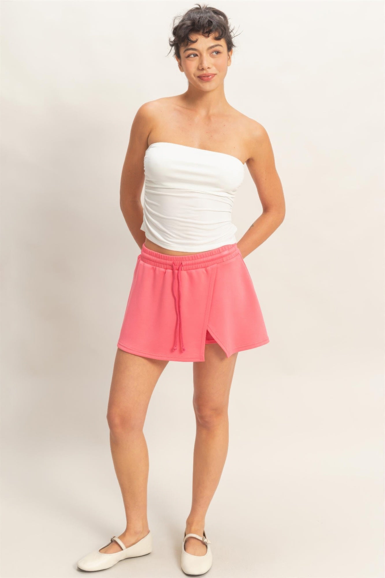 Taffy pink elastic-waist skort with wrap front and short, flared hem