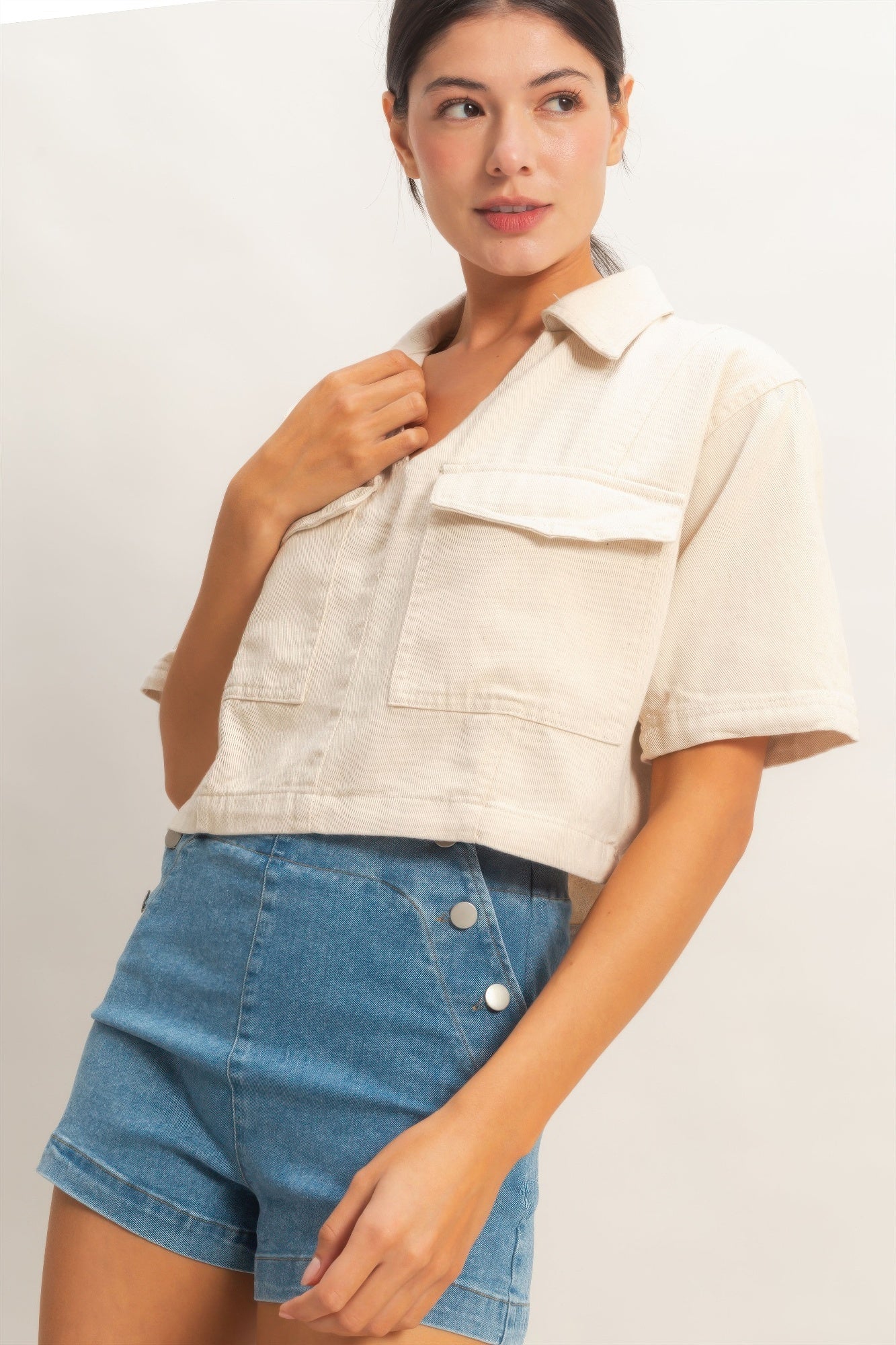 Oatmeal collared V-neck top, side view, short sleeves and front button placket
