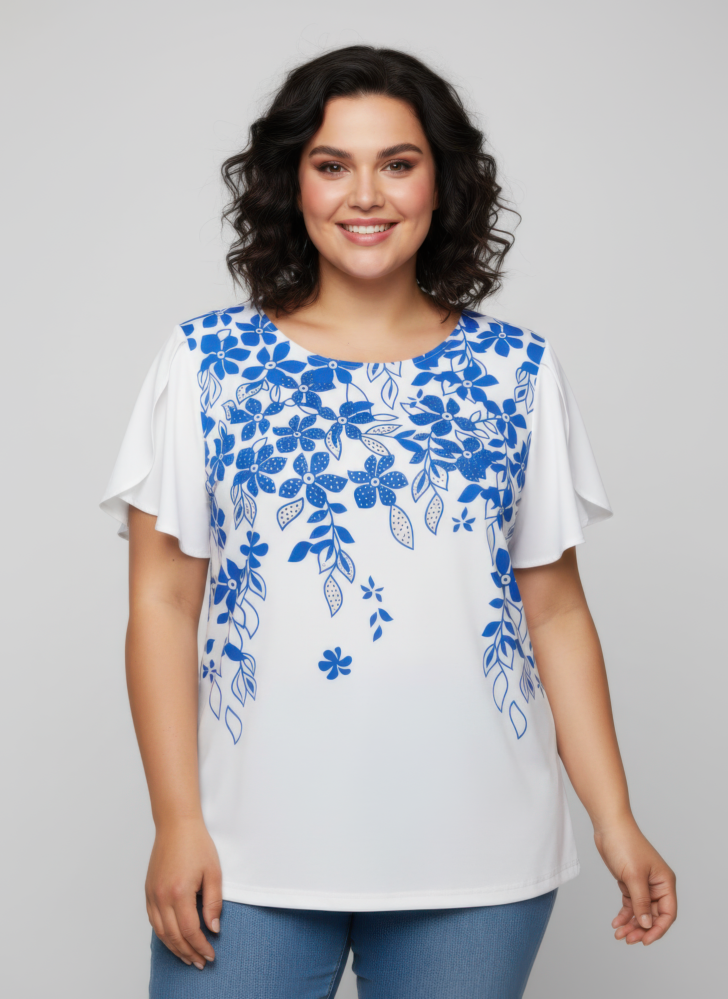 Blue floral print knit top with flutter sleeves; round neck on white base