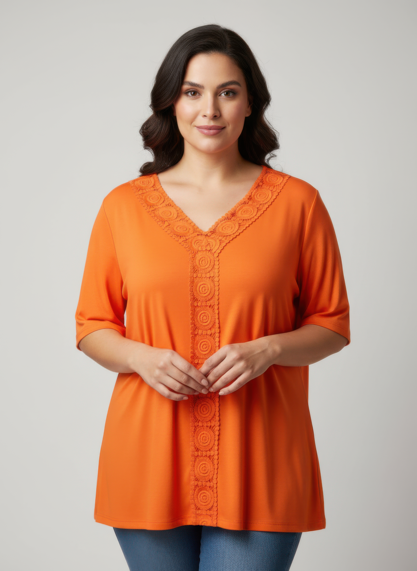Orange lace-trim V-neck short sleeve knit top with scalloped trim down center