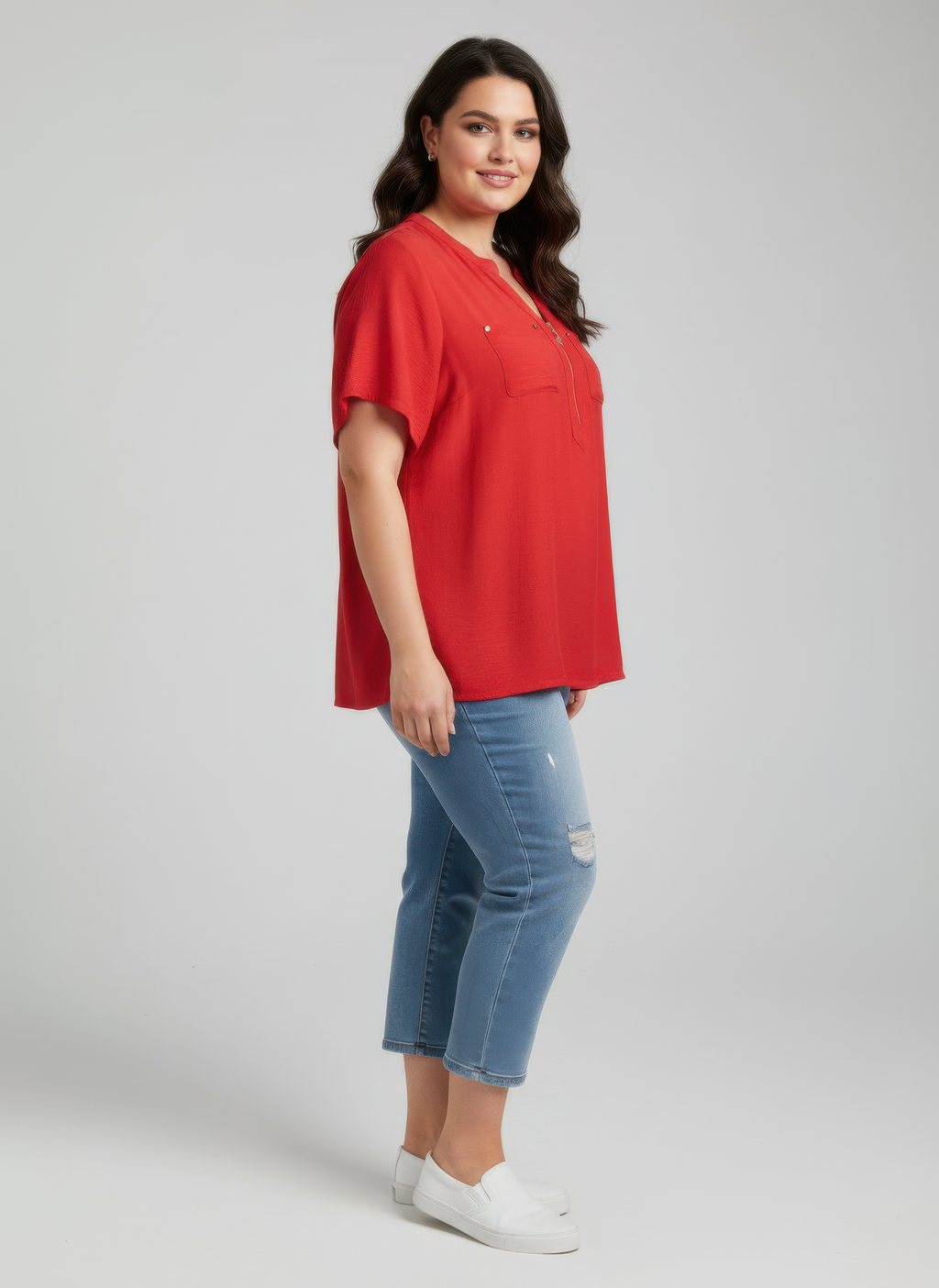 Red zip-front utility knit top with short sleeves and chest pockets