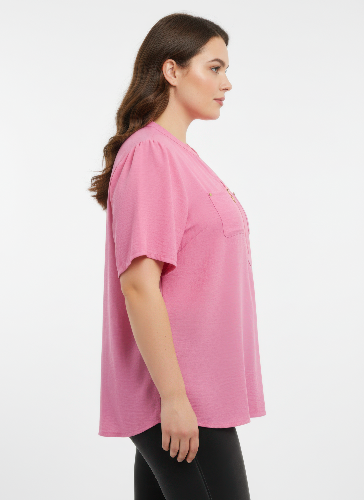 Pink zip-front utility knit top with short sleeves and chest pocket