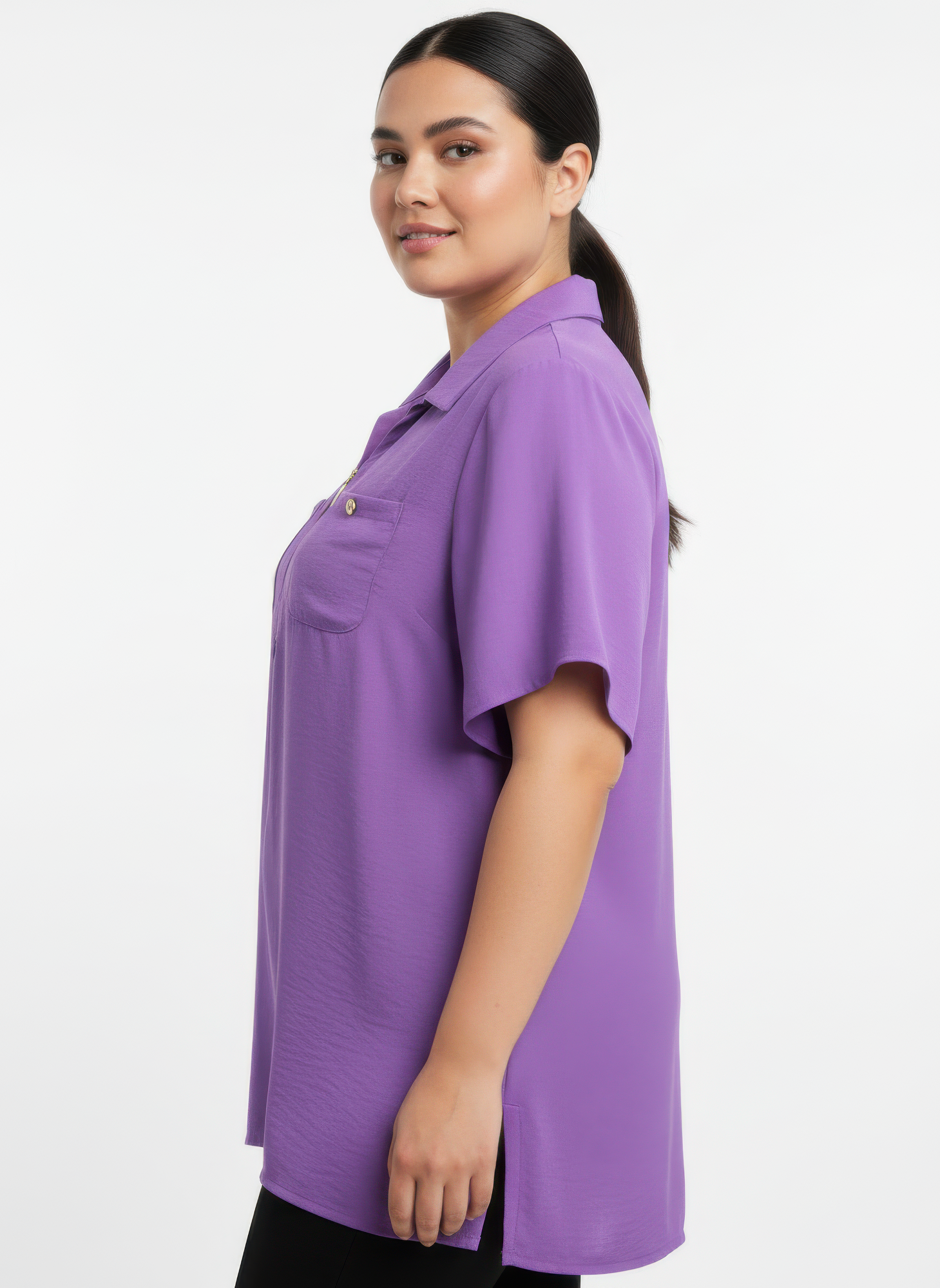 Purple utility knit top, side view: zip-front placket and chest pockets, short sleeves