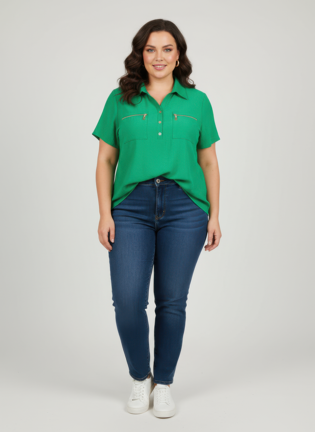 Green knit tunic top with zip pockets and collar, short sleeves