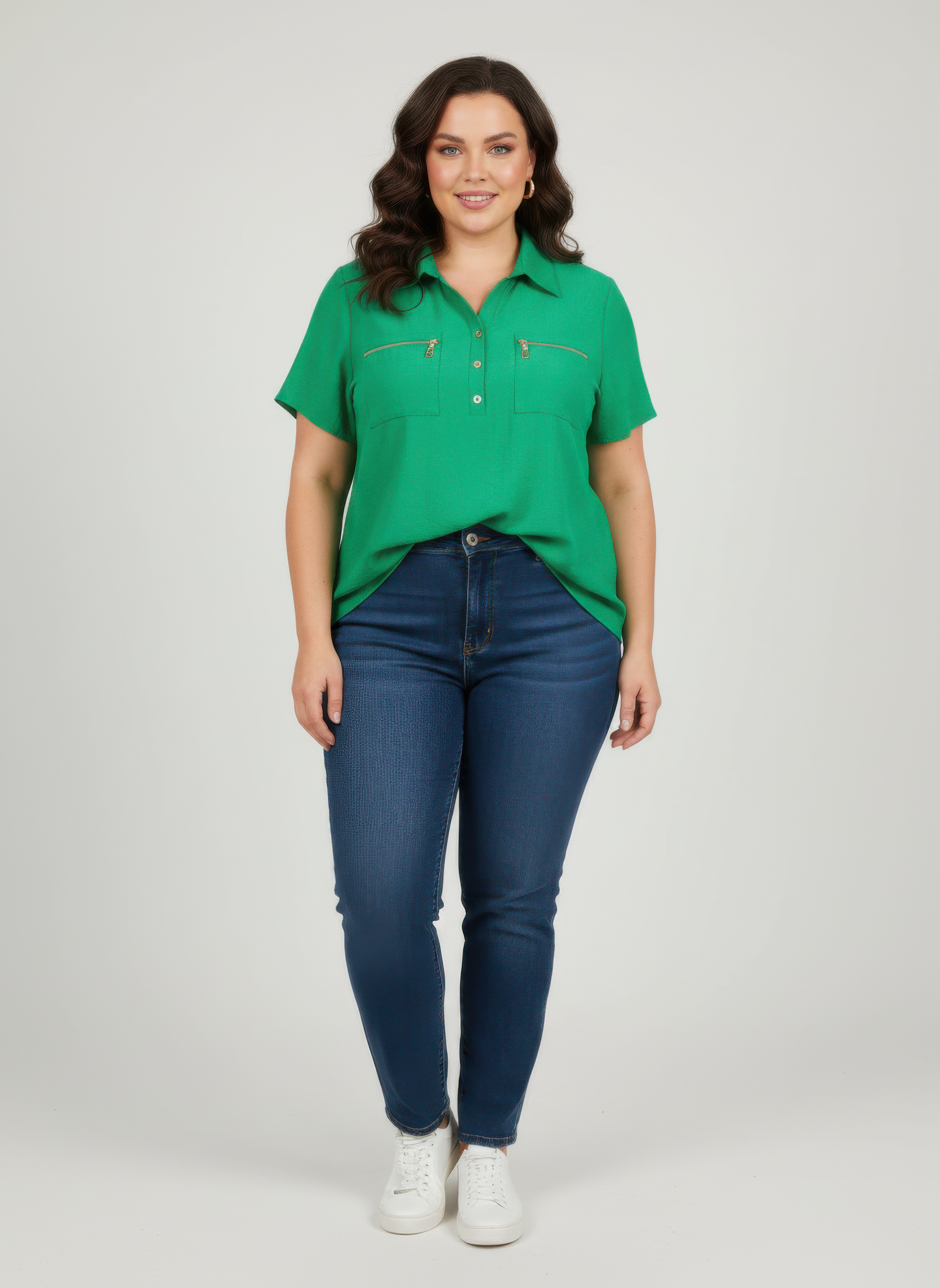 Green knit tunic top with zip pockets and collar, short sleeves