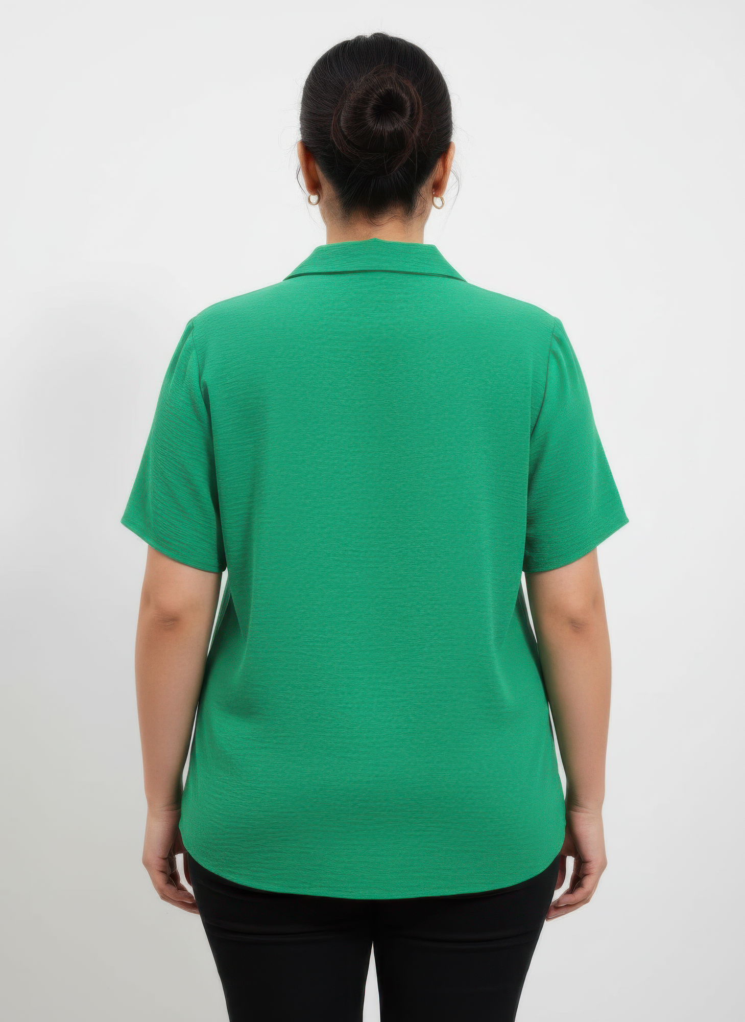 Back view of green collared knit tunic top with short sleeves