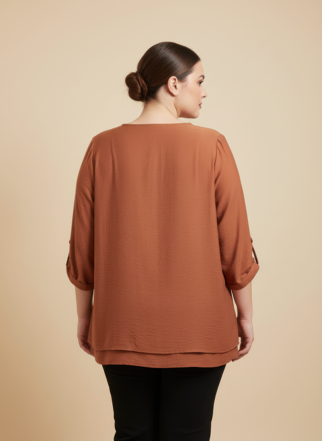 Back view knit tunic with lace detail and bell sleeves, rust-brown
