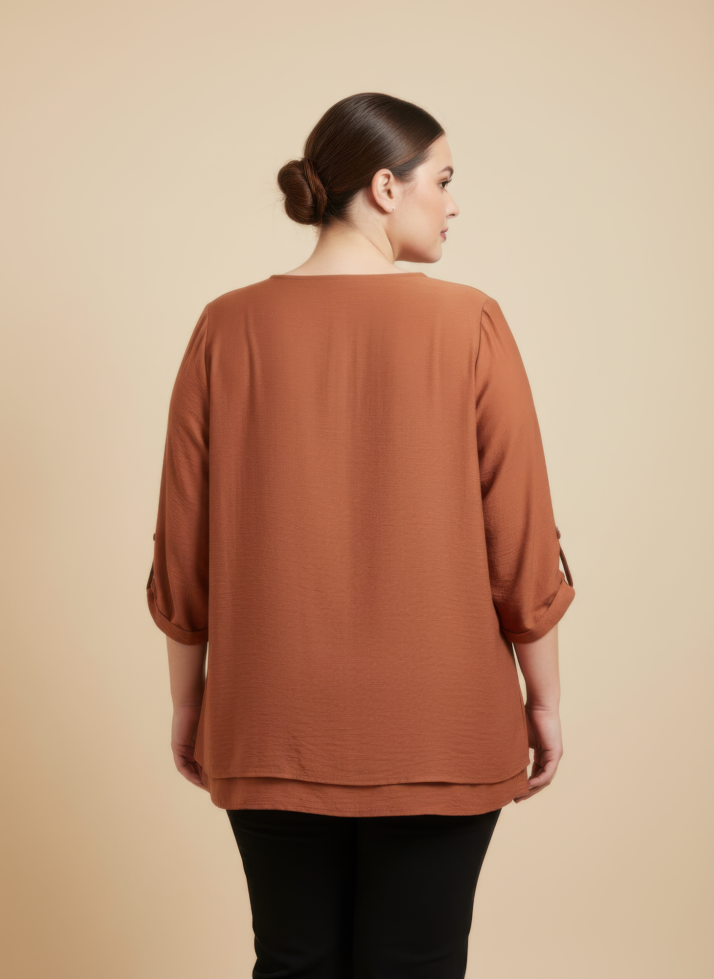 Back view knit tunic with lace detail and bell sleeves, rust-brown