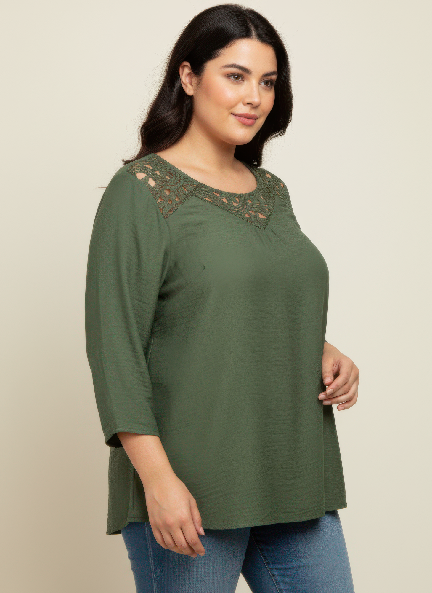Green lace yoke knit tunic, side view, loose fit with cutout yoke panel