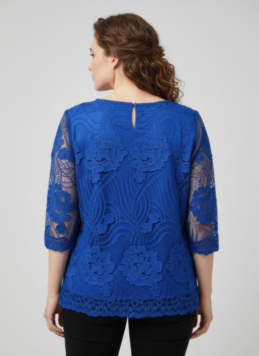 Blue lace blouse back view with keyhole opening and floral scalloped bottom