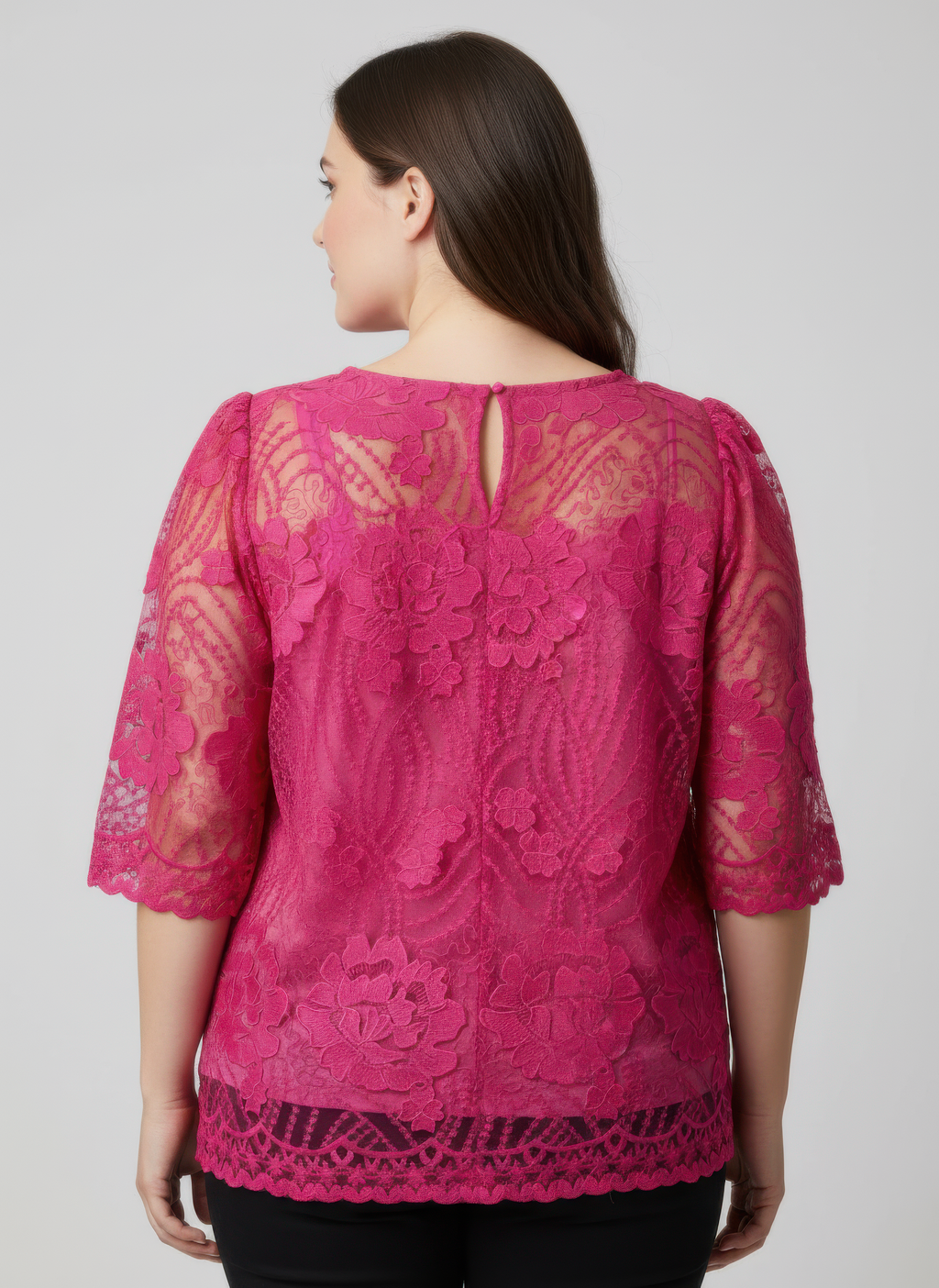 Back view: pink floral lace blouse with scalloped hem and short sleeves