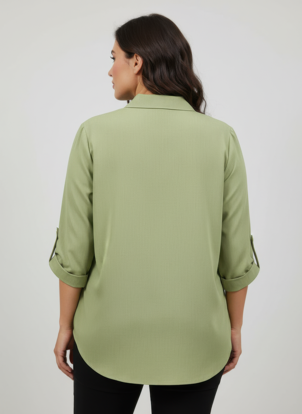 Back view of green zip-front utility pocket tunic blouse with 3/4-length sleeves