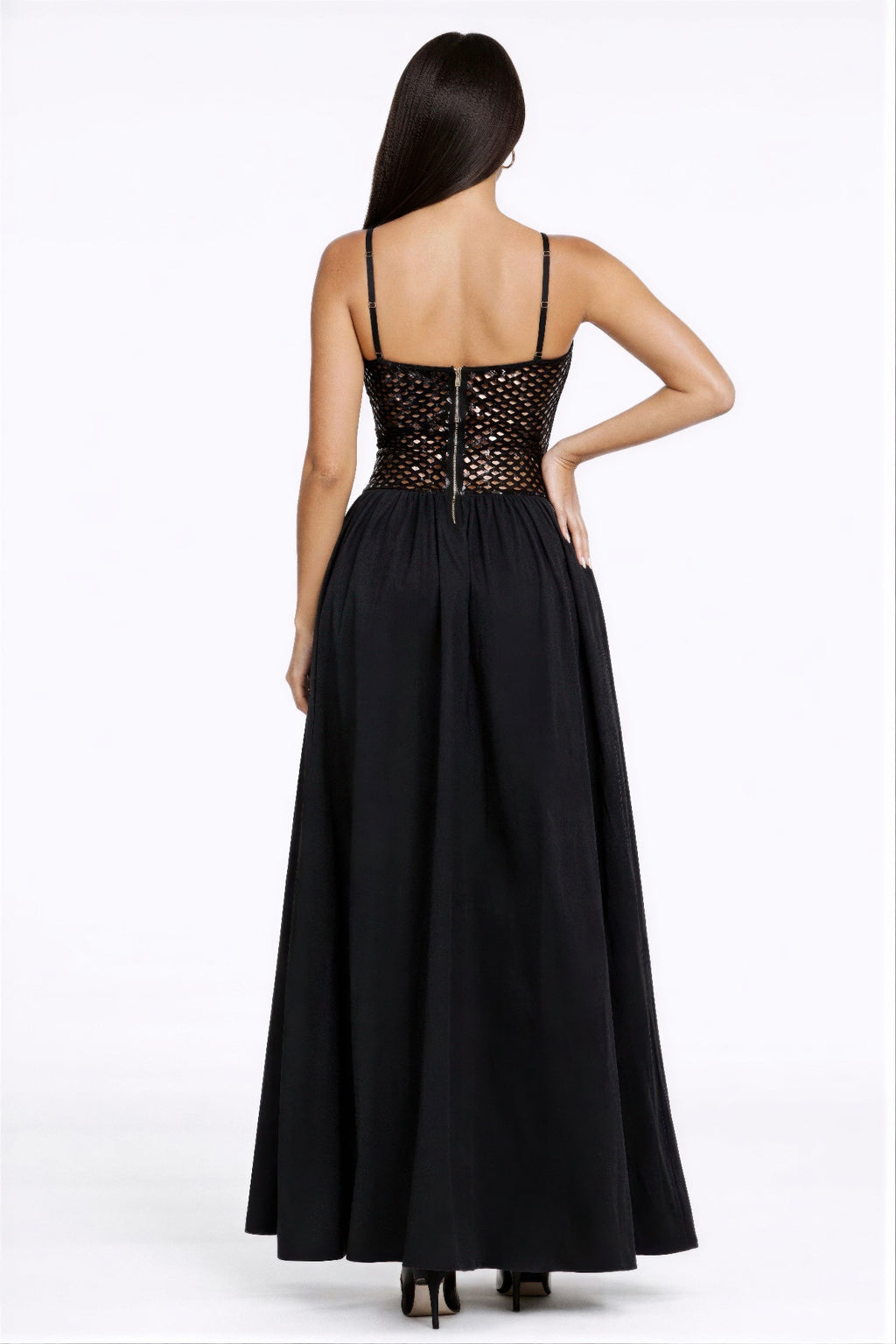 Back view of black netted sequin maxi dress with adjustable straps and full skirt