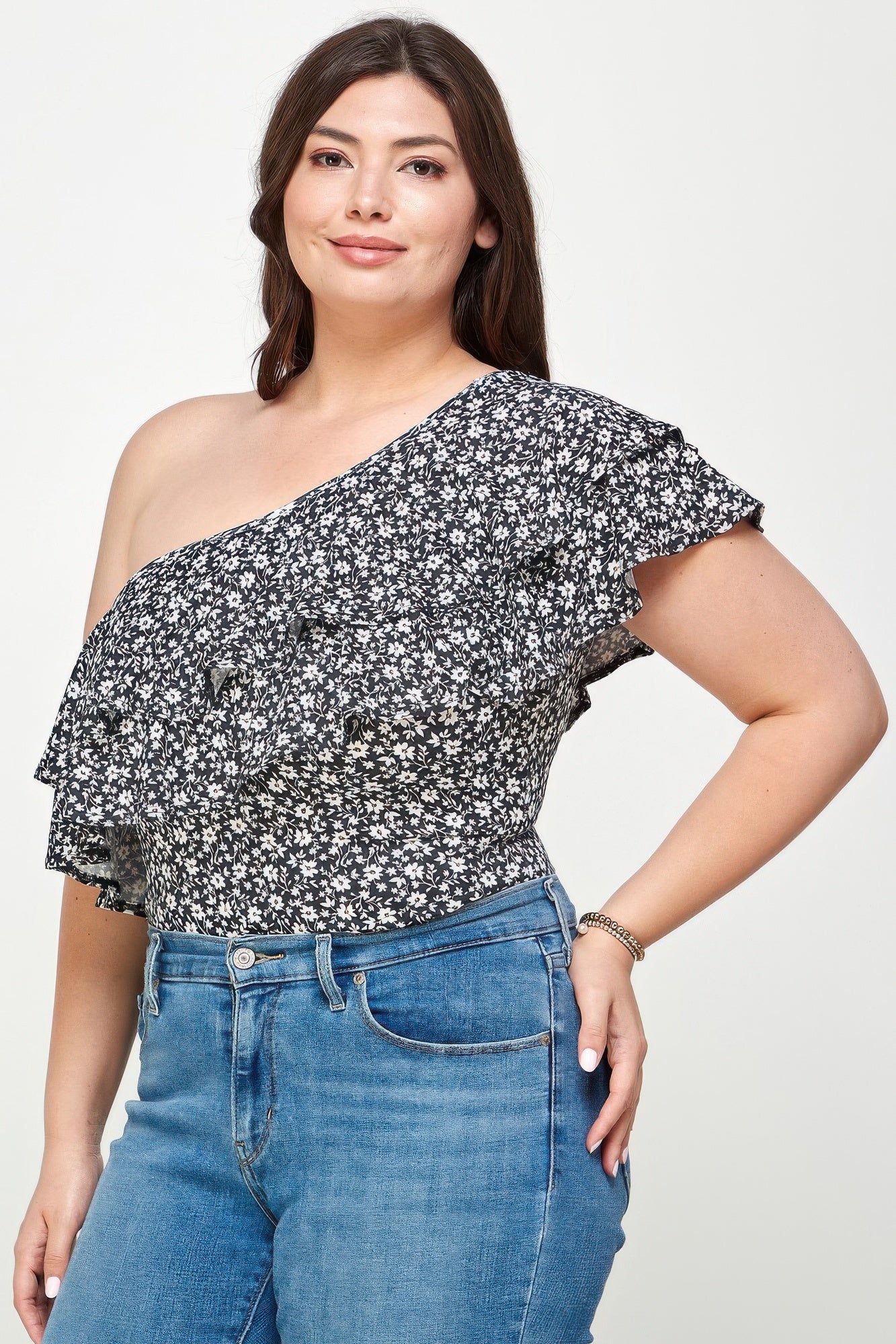 Bodysuit monospalla nero con stampa ditsy e volant sul fianco