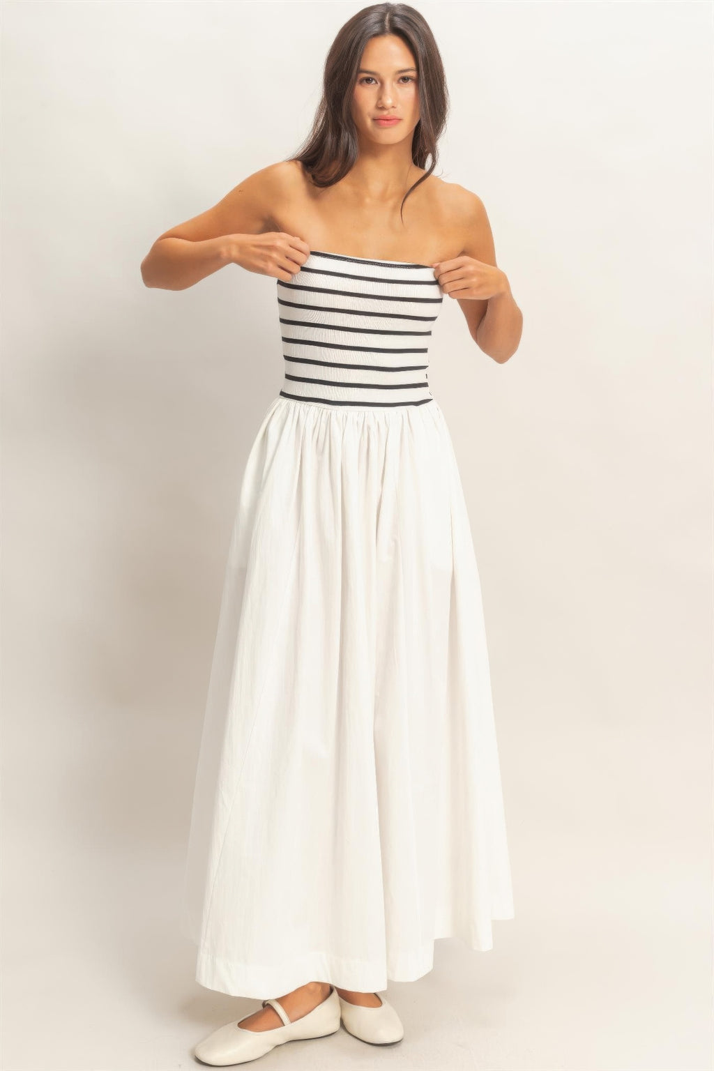 Striped strapless flowy midi dress with smocked bodice and full white skirt