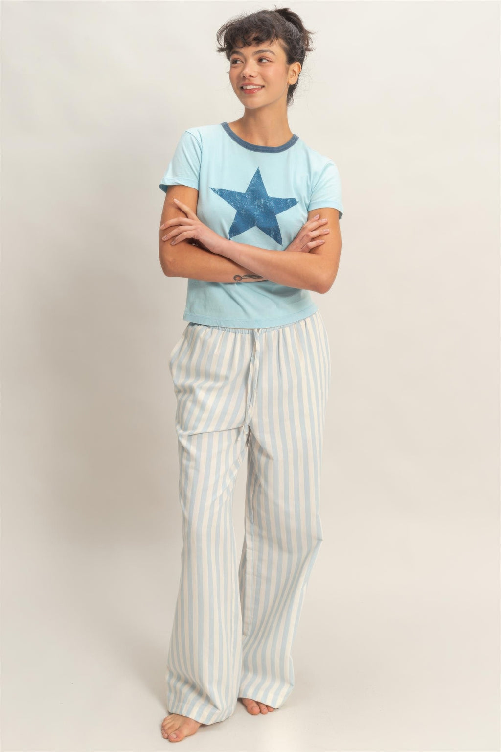Light blue/white striped wide-leg pants with elastic waist and side pockets
