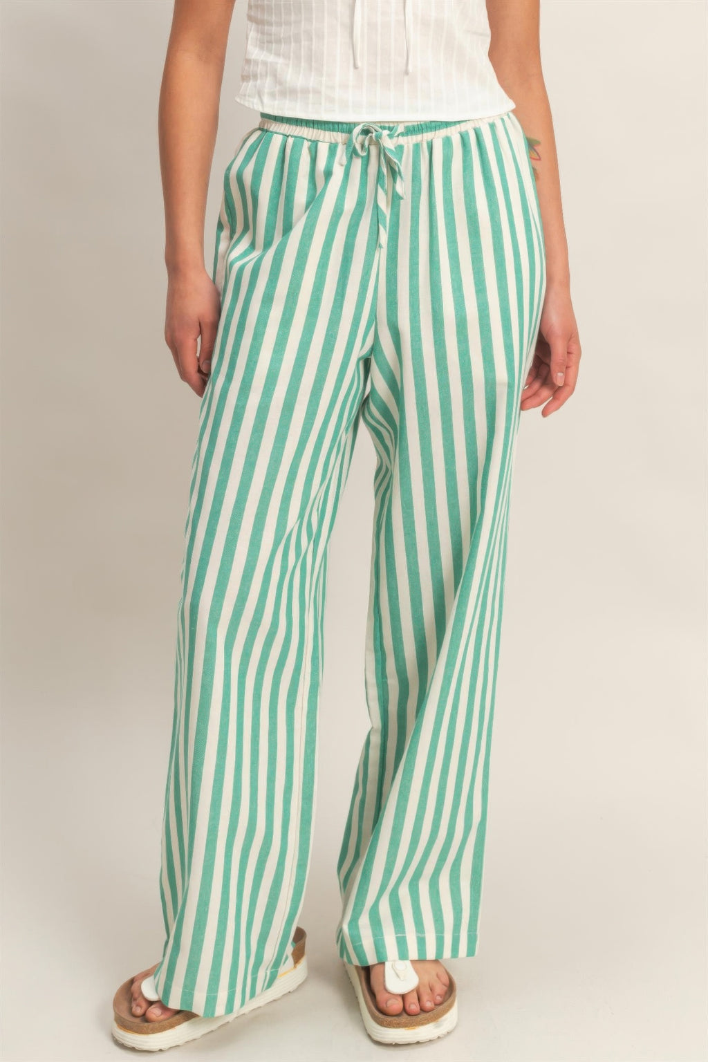 Green-and-white vertical striped elastic-waist wide-leg pants with side pockets