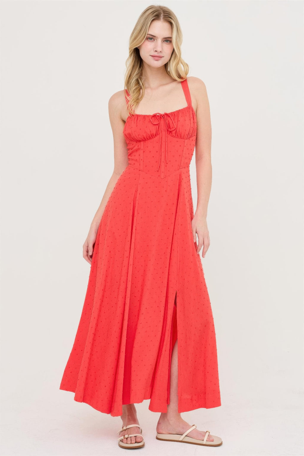 Blood orange boned tie-back dress with textured dot print, ruched square neckline