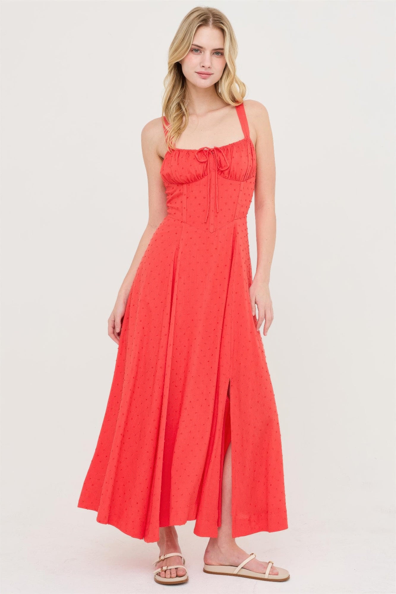 Blood orange boned tie-back dress with textured dot print, ruched square neckline