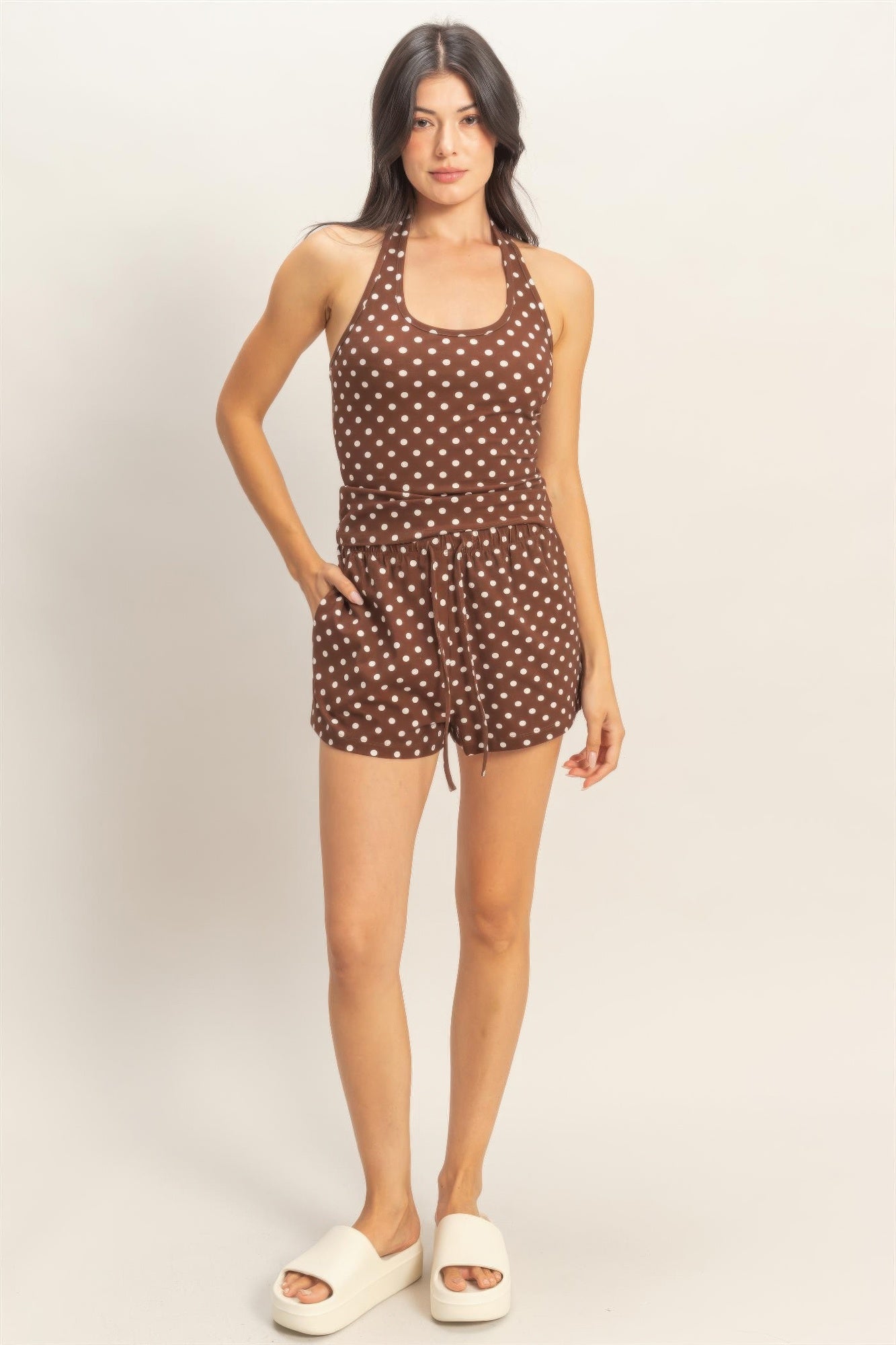 Polka dot drawstring shorts in brown with white dots, elastic waist and drawstring