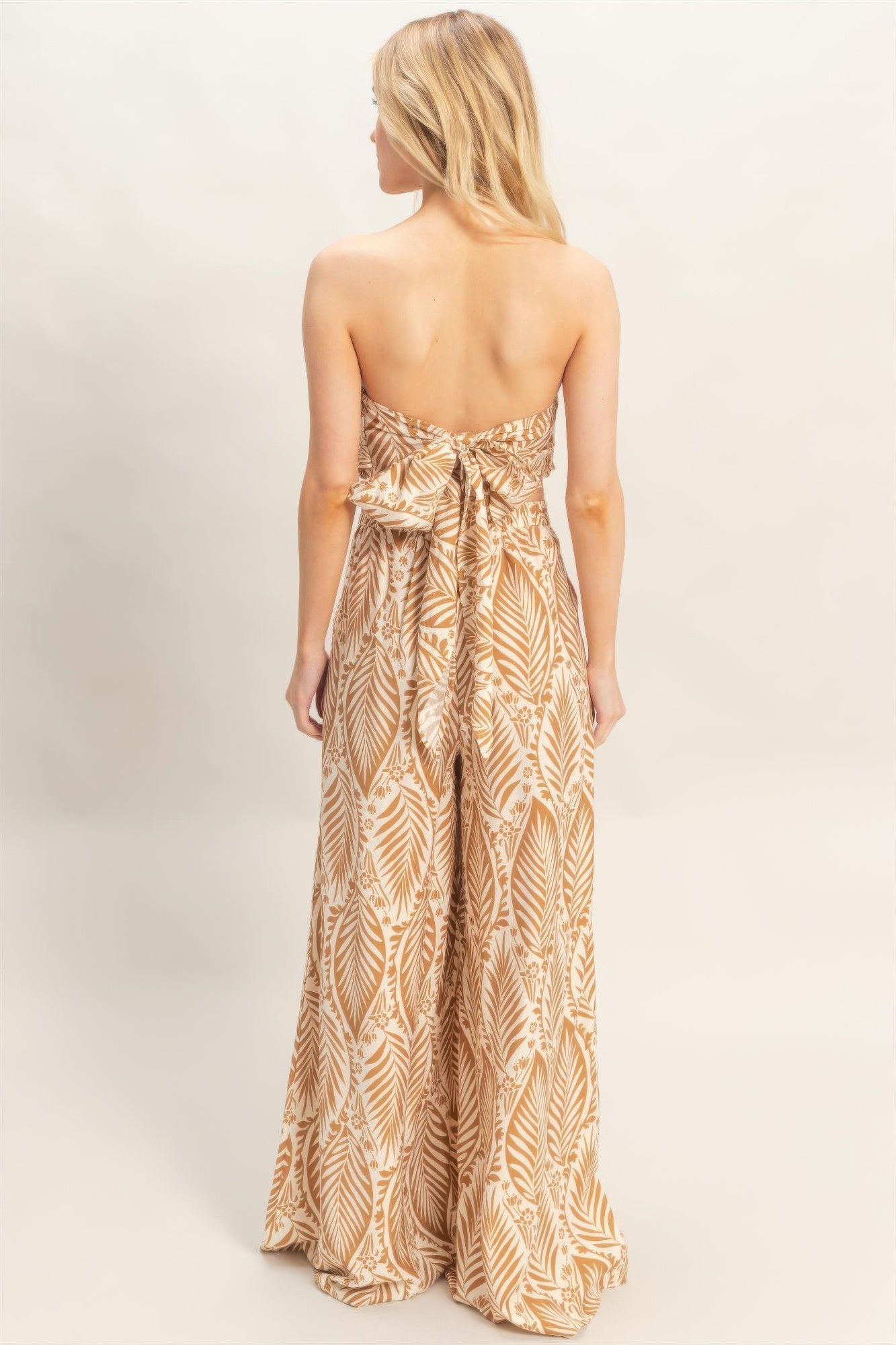 Light brown leaf print strapless top and wide-leg pant set
