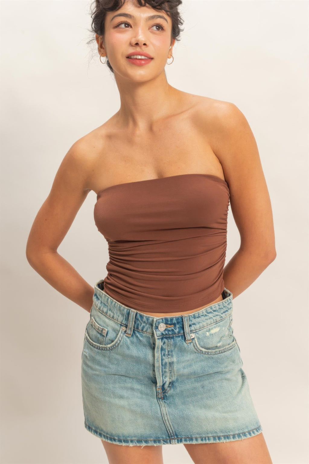 Ruched bandeau top in chocolate brown, strapless neckline with gathered ruching.