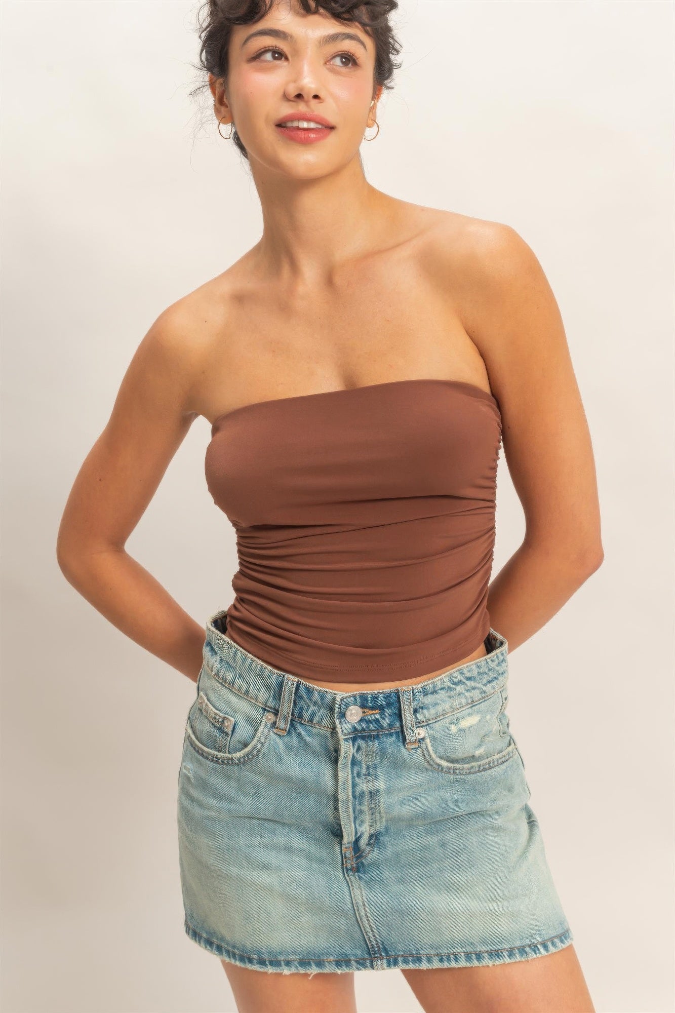 Ruched bandeau top in chocolate brown, strapless neckline with gathered ruching.