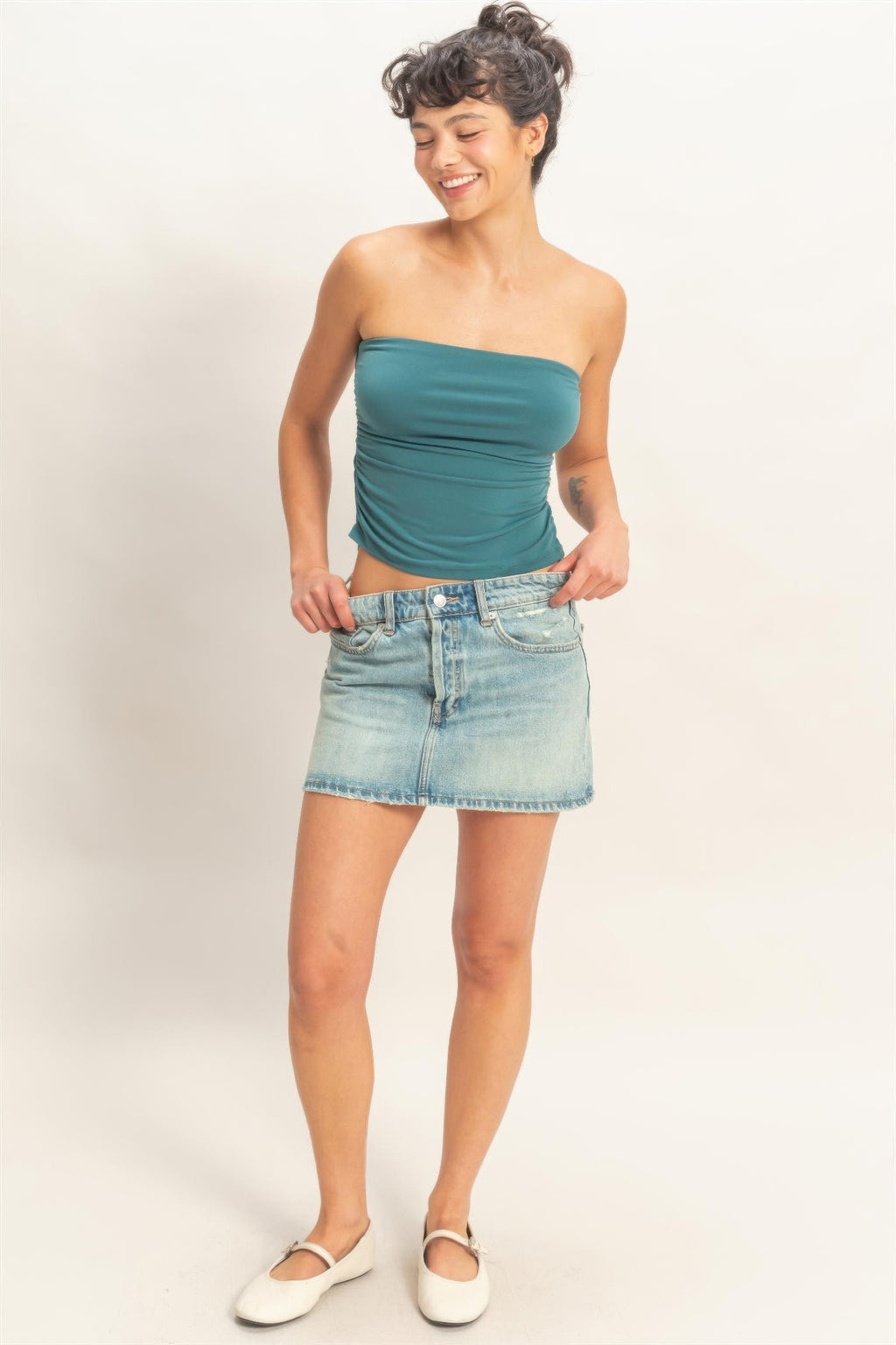 Dark teal ruched bandeau top, strapless fit with gathered detail along the sides.